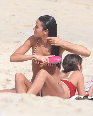 Picture tagged with: Skinny, Beach, Bikini, Brazilian, Bruna Marquezine, Brunette, Legs, Celebrity - Star, Cute
